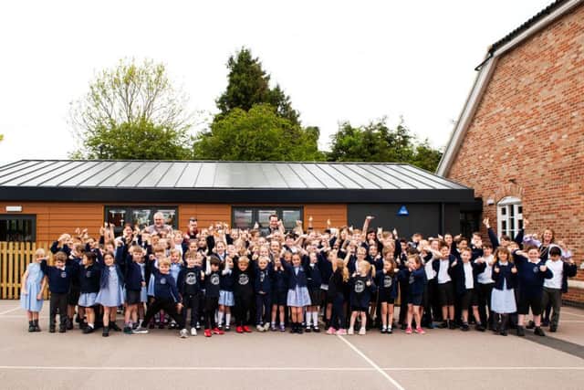 Redmile Primary School staff and pupils celebrate PHOTO: Supplied
