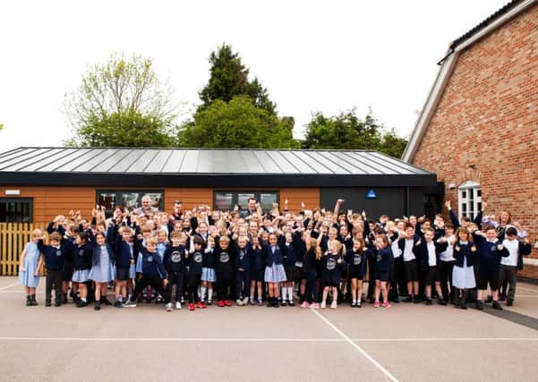 Redmile Primary School staff and pupils celebrate PHOTO: Supplied