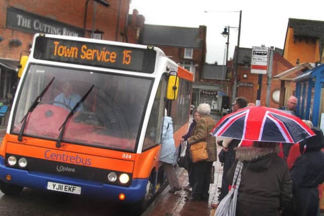 A Centrebus bus picks up passengers in St Mary's Way, Melton EMN-180522-114501001