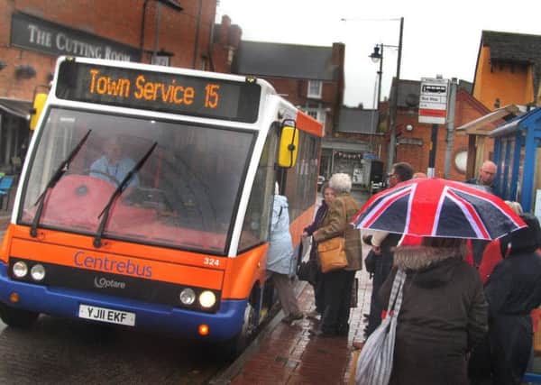 A Centrebus bus picks up passengers in St Mary's Way, Melton EMN-180522-114501001