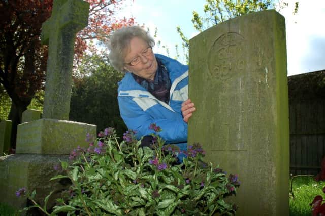 Melton in Bloom and Royal British Legion representative Lucy Wood  in the cemetery where she is campaigning to get graves of former servicemen cleaned up EMN-180518-173409001