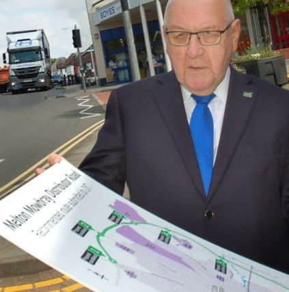 County councillor Byron Rhodes and long-term Melton bypass campaigner examines the route of the proposed MMDR after government funding was announced EMN-180521-163452001