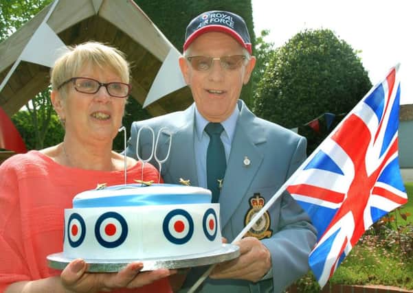 Warden Maggie Hill with resident Roger Cheese at a garden party at Wexford House in Melton to celebrate the 100th anniversary of the founding of the RAF EMN-180521-173235001