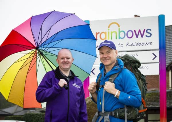 Andy Matthews (right) with support care fundraiser for Rainbows Hospice Neil Swift PHOTO: Martin Neeves Photography and Film