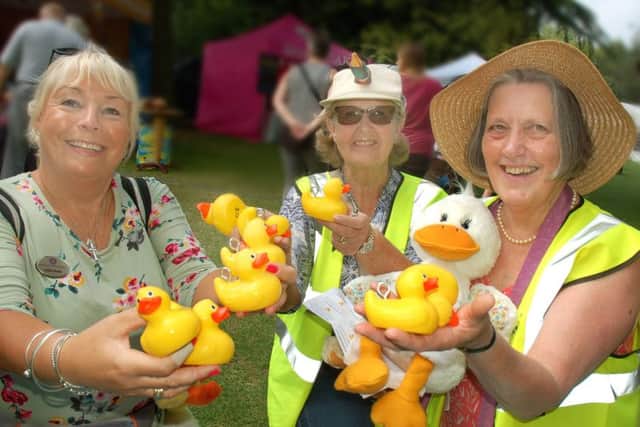 Rotarians Julia Hinde, Janet Shortland and Alison Blythe busy selling the ducks PHOTO: Tim Williams