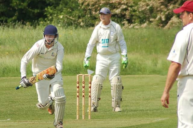 Steve Coddington sets off on a rare run, but Queniborough successfully defended 127 EMN-180529-181129002