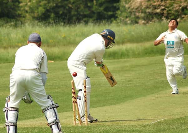 Ian Parrott has his stumps rearranged by Frisby bowler David Iliffe who completed a miserly five-wicket haul EMN-180529-181140002