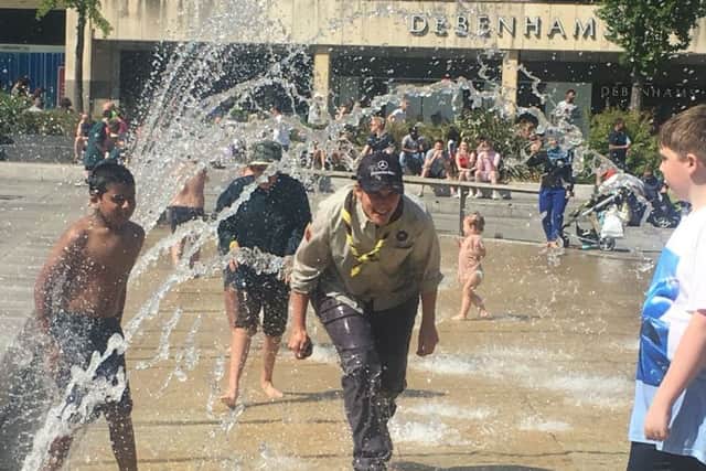 One of the leaders gets a soaking from the fountains PHOTO: Supplied