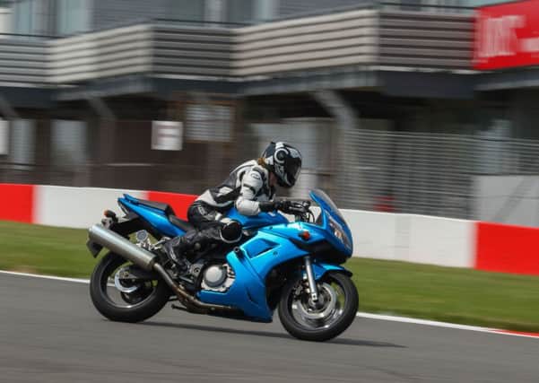 Claire Lomas, who is paralysed from the chest down, takes part in her first racing track day at Donington Park ahead of her bid to complete a lap of the Isle of Man TT road race course
PHOTO: Mark Lees/MSV Photography EMN-180106-143427001