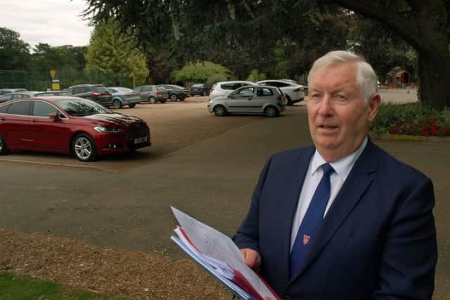 Melton Town Estate Feoffee John Southerington consults plans for a recent scheme to upgrade the Wilton Park car park EMN-180406-162813001