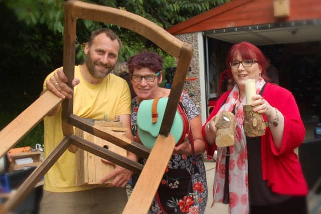 Woody Kitson, Sue Cox and Liz Cox with items which have been made or restored at a Melton Space session EMN-180806-095227001