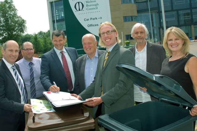 Melton Council leader, Councillor Joe Orson, and chief executive, Edd de Coverly, with officials from Biffa, at the signing of the borough's new waste contract EMN-180806-124901001