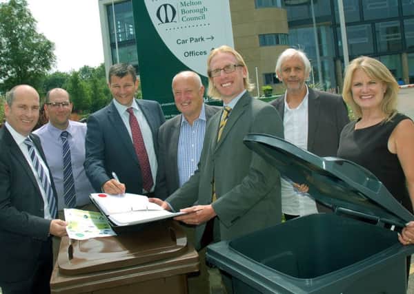 Melton Council leader, Councillor Joe Orson, and chief executive, Edd de Coverly, with officials from Biffa, at the signing of the borough's new waste contract EMN-180806-124901001
