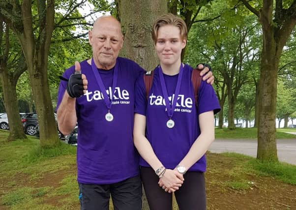 Bob White and step-grand-daughter Joni who raised more than Â£700 for a cancer charity campaign with a cycle around Rutland Water EMN-181106-114822001