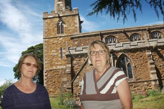 Treasurer Kathryn Letts and Sandra Leeson (left) at St Peter's Church, at Tilton on the Hill, where thieves have stolen lead from the roof three times in six months EMN-181106-174445001