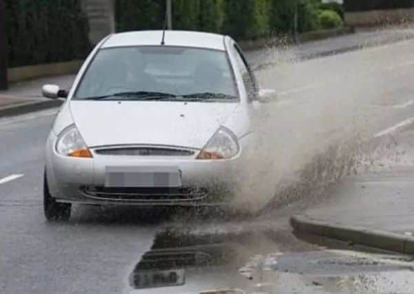 Driving through a puddle could land you in trouble