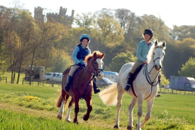 Riding through the Belvoir Castle Estate PHOTO: Tim Williams