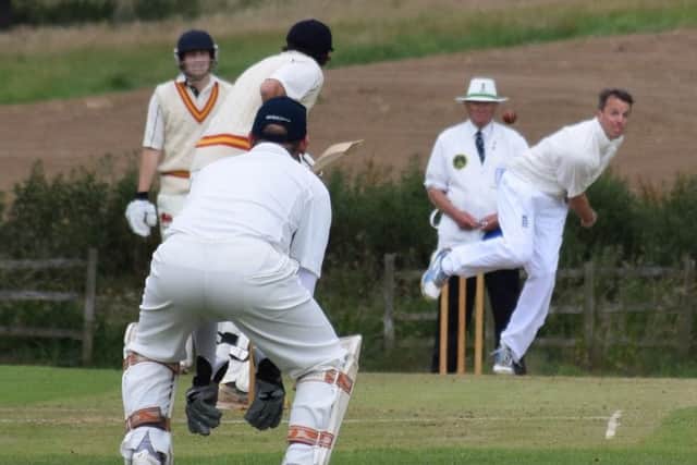 Vic Heppenstall keeps a close eye on Graeme Swann during a Belvoir Cricket and Countryside Trust feature match EMN-181206-180702002