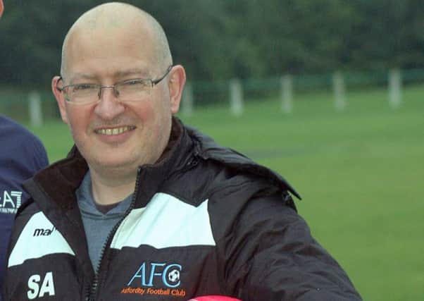 New chairman Simon Atherley led the Development side to a cup and promotion in their debut season EMN-180613-130909002