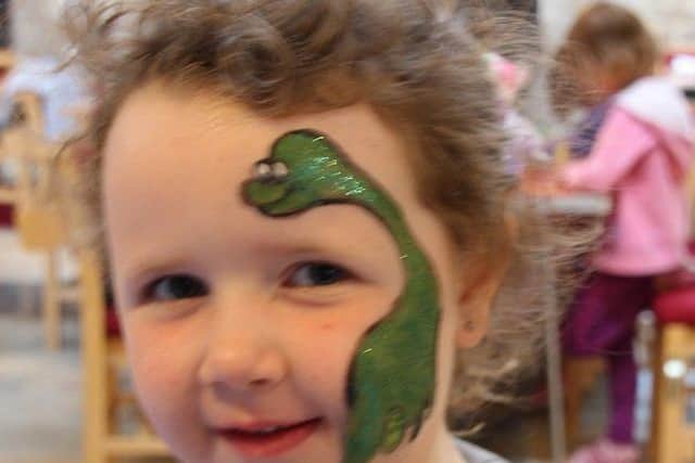 Looking T-riffic with dinosaur face paint PHOTO: Supplied