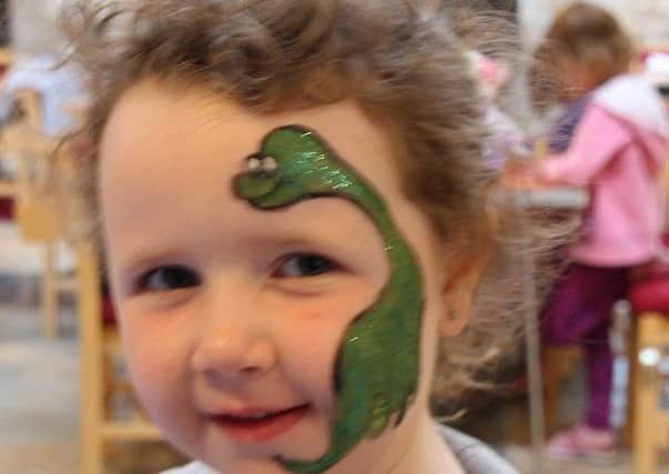 Looking T-riffic with dinosaur face paint PHOTO: Supplied