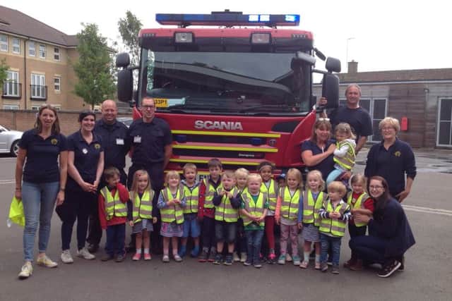 Young people from Whissendine Pre-school meet local heroes at Oakham Fire Station PHOTO: Supplied