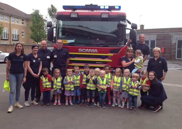 Young people from Whissendine Pre-school meet local heroes at Oakham Fire Station PHOTO: Supplied