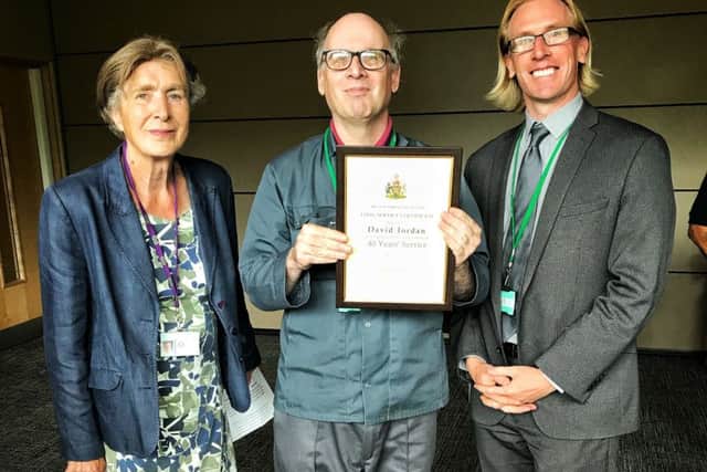 Melton Mayor Pru Chandler and Edd de Coverly, chief executive of Melton Borough Council, with award recipient David Jordan PHOTO: Supplied
