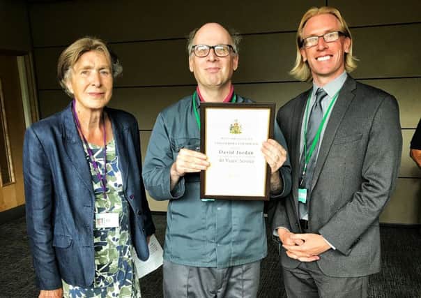 Melton Mayor Pru Chandler and Edd de Coverly, chief executive of Melton Borough Council, with award recipient David Jordan PHOTO: Supplied