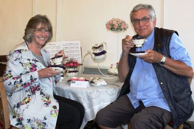 More tea vicar? Melton Mowbray Team Parish Rector, the Rev Kevin Ashby, and his wife Alyson enjoy a welcome cuppa in St Bartholomew's Church, Welby PHOTO: Supplied