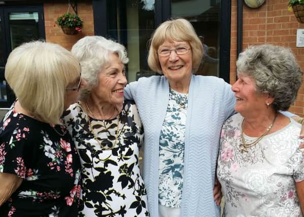 Great-great-grandmother Shirley Garratt, who is planning to do a charity skydive, pictured with friends from the drop-in club at Age UK Gloucester House in Melton EMN-180615-121445001