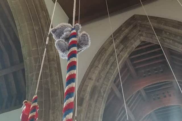A teddy descends from the church bell tower PHOTO: Supplied