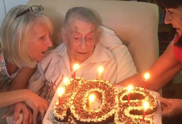 Pam Cates celebrates her 102nd birthday at Hunter's Lodge retirement home at Old Dalby with Hunter's Lodge retirement home activities staff Lesley Firmager and Fiona Gechie EMN-180625-161747001