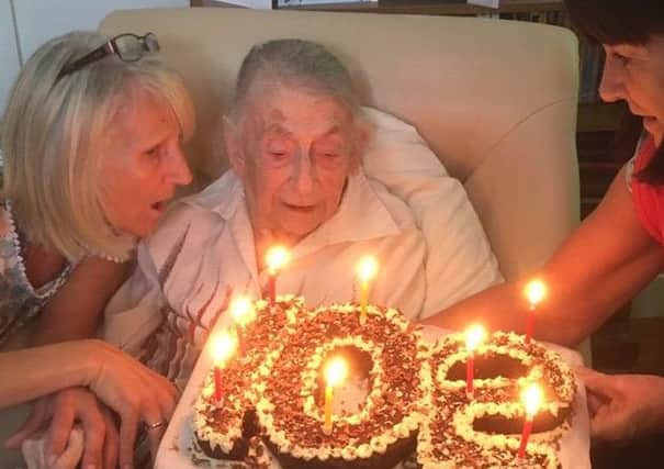 Pam Cates celebrates her 102nd birthday at Hunter's Lodge retirement home at Old Dalby with Hunter's Lodge retirement home activities staff Lesley Firmager and Fiona Gechie EMN-180625-161747001