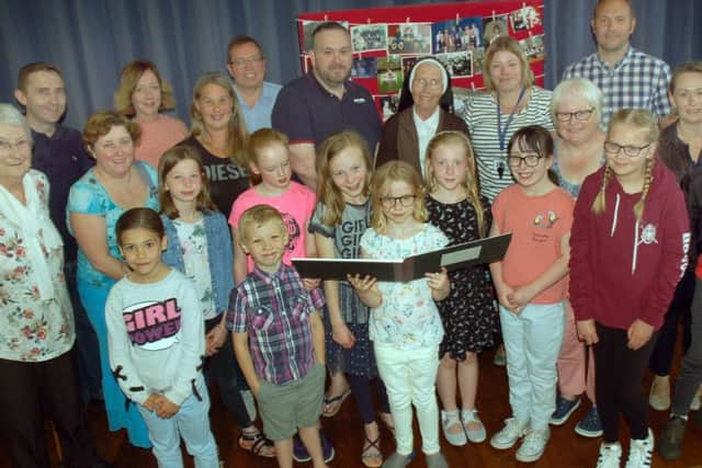 Past and current St Francis Catholic Primary School pupils at their special memory day EMN-180626-154436001