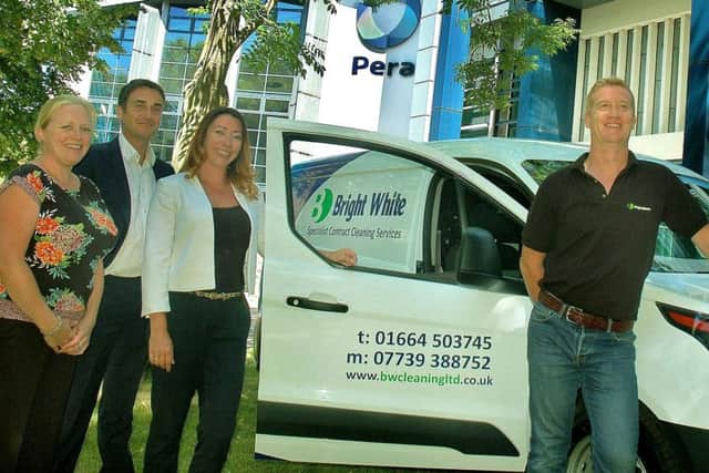 Bright White Cleaning staff Jenny Mewett, Laura Jarvis and Nick Smith with Pera M.D. Nigel Brown ( 2nd left).