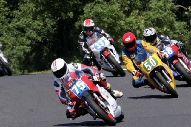 Ant Hart (75) leads the chasing pack at Cadwell EMN-180628-085859002