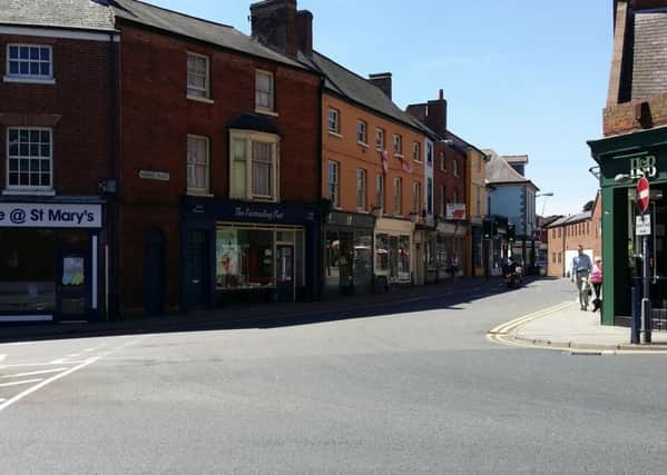 The junction of Market Place with Burton Street in Melton EMN-180307-125530001