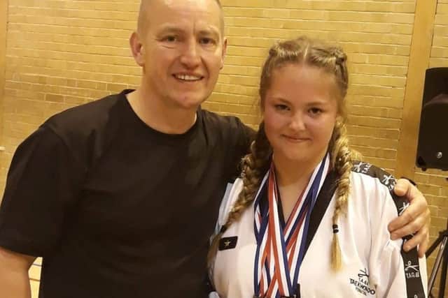 Instructor Stuart Davison with top performer Millie-Mae Harris EMN-180507-153855002