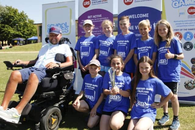 Old Dalby Primary School's swimmers, pictured with Go Gold Ambassador Matt Hampson, won bronze as well as the Spirit of the Games fair play award EMN-180507-171542002