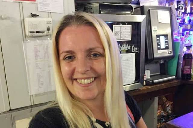 Rachel Piwek pictured before her charity head shave at The Grapes pub in Melton EMN-180907-101831001