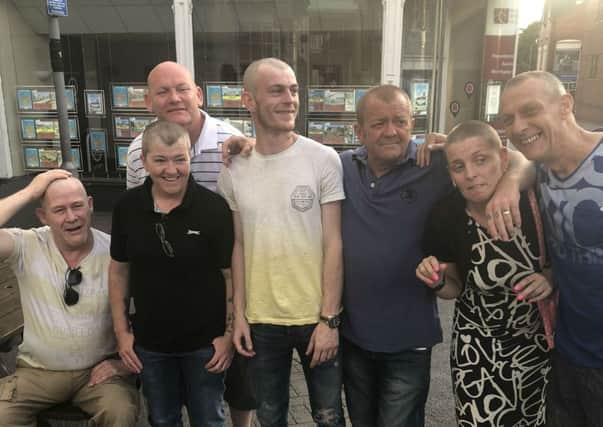 Regulars pictured after their charity head shaves at The Grapes pub in Melton EMN-180907-101841001