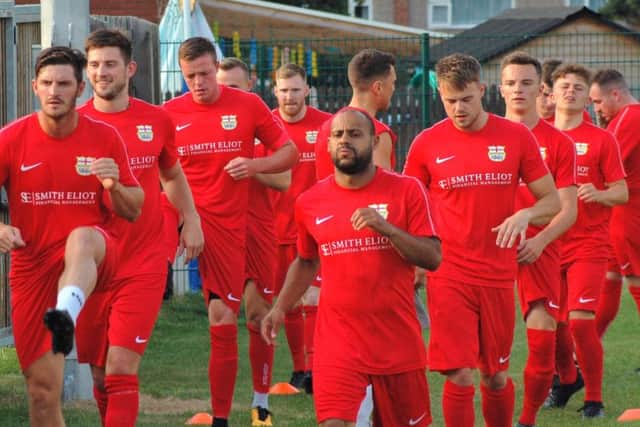 Town's new-look squad warms up before the opening friendly EMN-181107-124028002