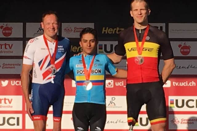 Simon Price returned to the podium in Emmen, with race winner Alejandro Perea Arango and bronze medallist Ewoud Vromant, of Belgium EMN-181107-162024002
