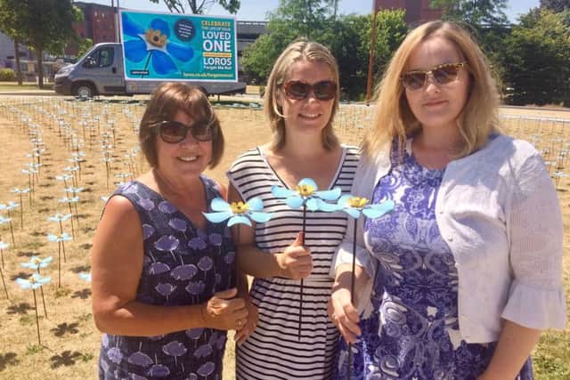 Catherine Ashman-Lee (right), who is supporting the LOROS Forget Me Not flower campaign, with her mum, Kate Wilkins (left) and friend, Rachel Starkey EMN-180713-125650001