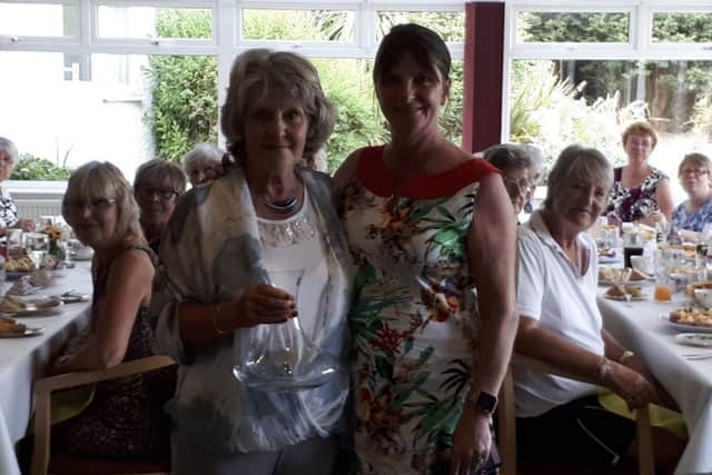 Drina Terrza recieves the Past Lady Captains' Trophy EMN-180717-123750002