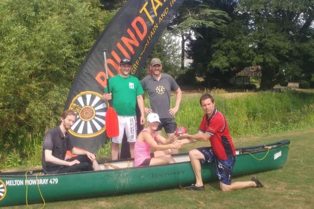 Mark Cook, chairman of Melton Round Table, presenting a 2lb Dickinson and Morris pork pie to winning skipper Jenny Atkinson, with crew Ben Jackson, Martin Coe and Chris Bell PHOTO: Supplied