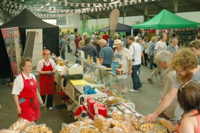 Crowds at Melton Cattle Market sample a tempting variety of pies, pastries and bread at the 2017 PieFest PHOTO: Tim Williams EMN-180723-110530001