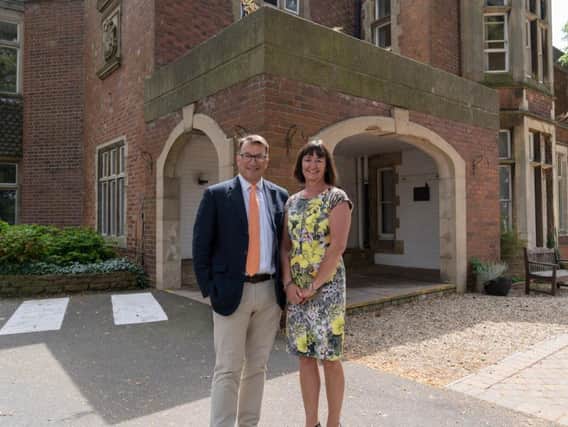 Directors of Rotherhill Developments, Paul Bagshaw and Sally Bagshaw outside their new offices at Pera.