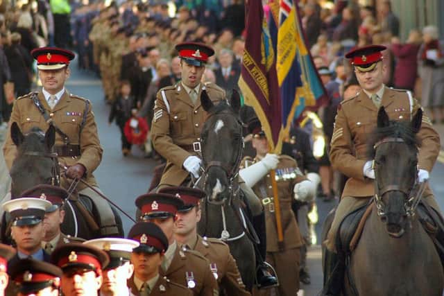 Mounted officers from the Defence Animal Centre, Melton, taking part in the 2016 Remembrance Day parade through Melton EMN-180725-095131001